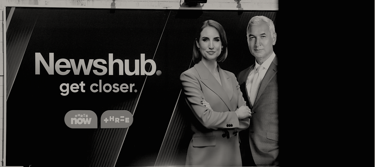 Newshub Billboard, reading 'get closer' - three now & three.